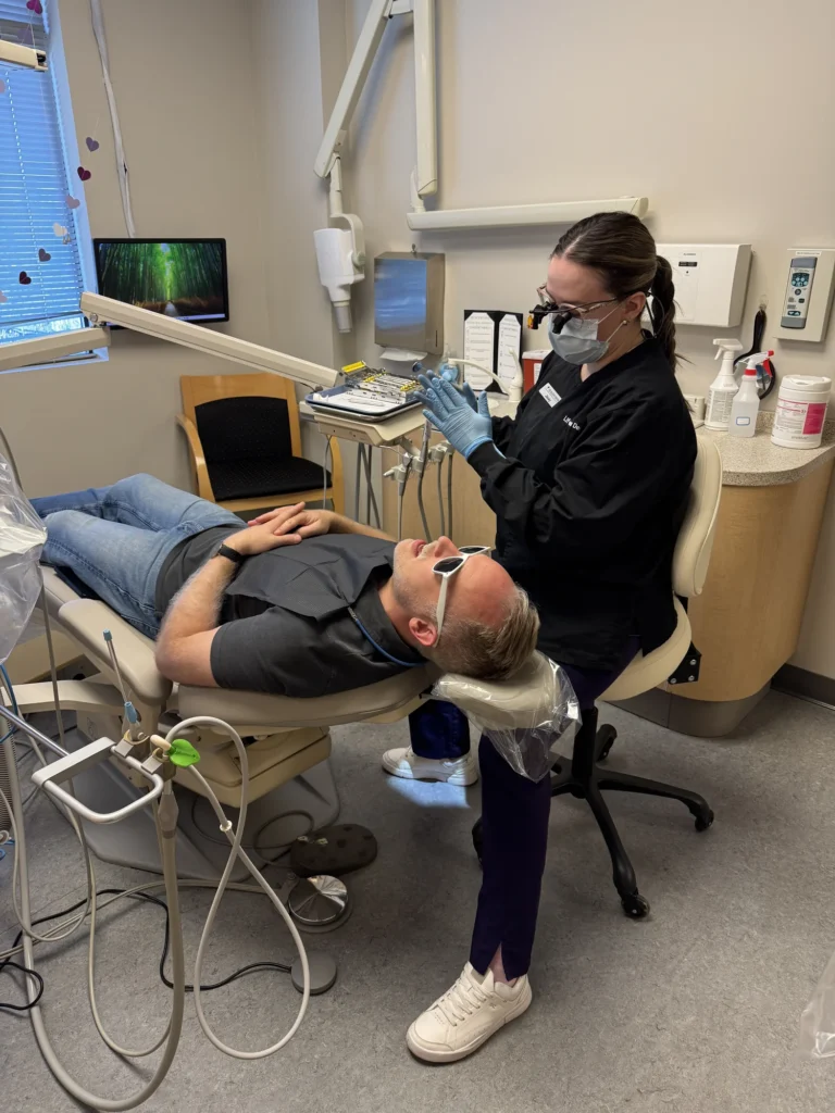 A Life Bloom Dental hygienist cleaning a patient’s teeth